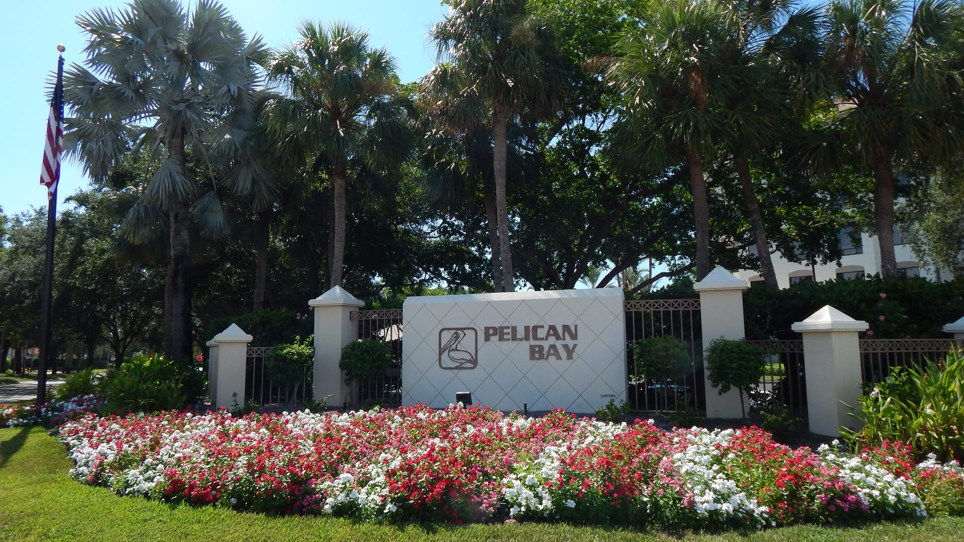 The Pelican Bay Neighborhood in Naples, FL 34108's sign, as taken by custom closet company Gulfshore Closets, proudly serving Naples, Florida. Are you searching for a custom closet company near Pelican Bay in Naples, Florida? Look no further than Gulfshore Closets! We specialize in creating custom closet designs and organizational storage solutions to meet all your needs. 